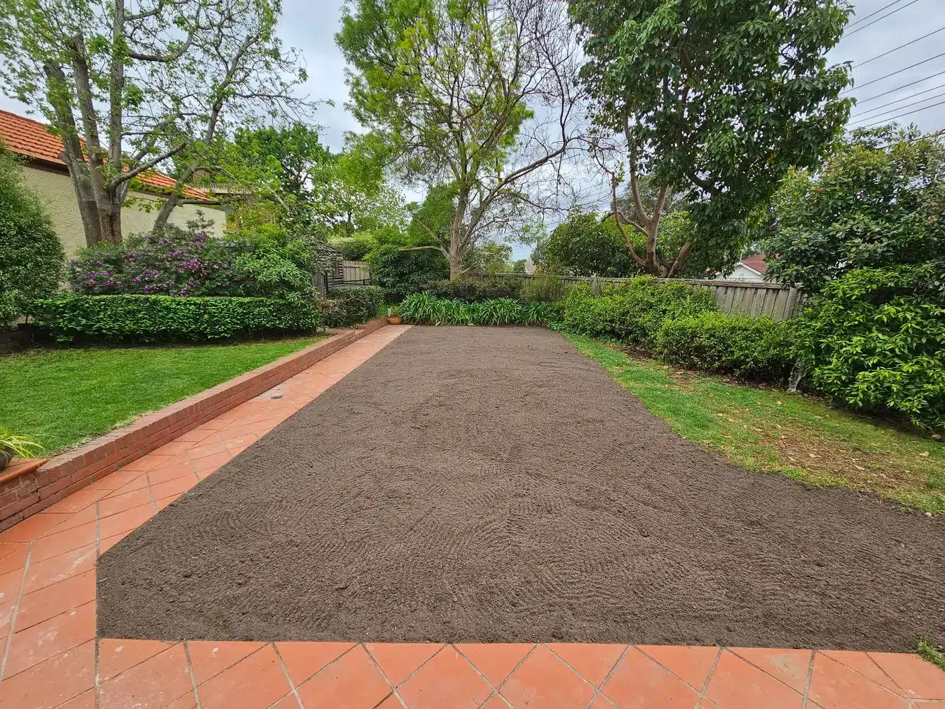 After: pool removed and area filled and levelled